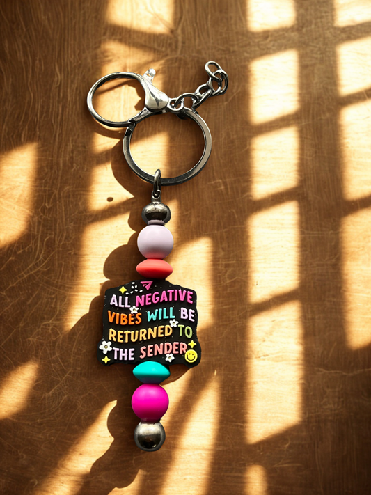 “All Negative Vibes Will Be Returned to the Sender” Keychain