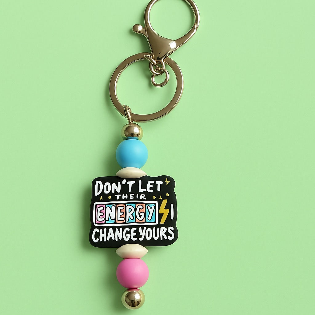 “Don’t Let Their Energy Change Yours” Keychain