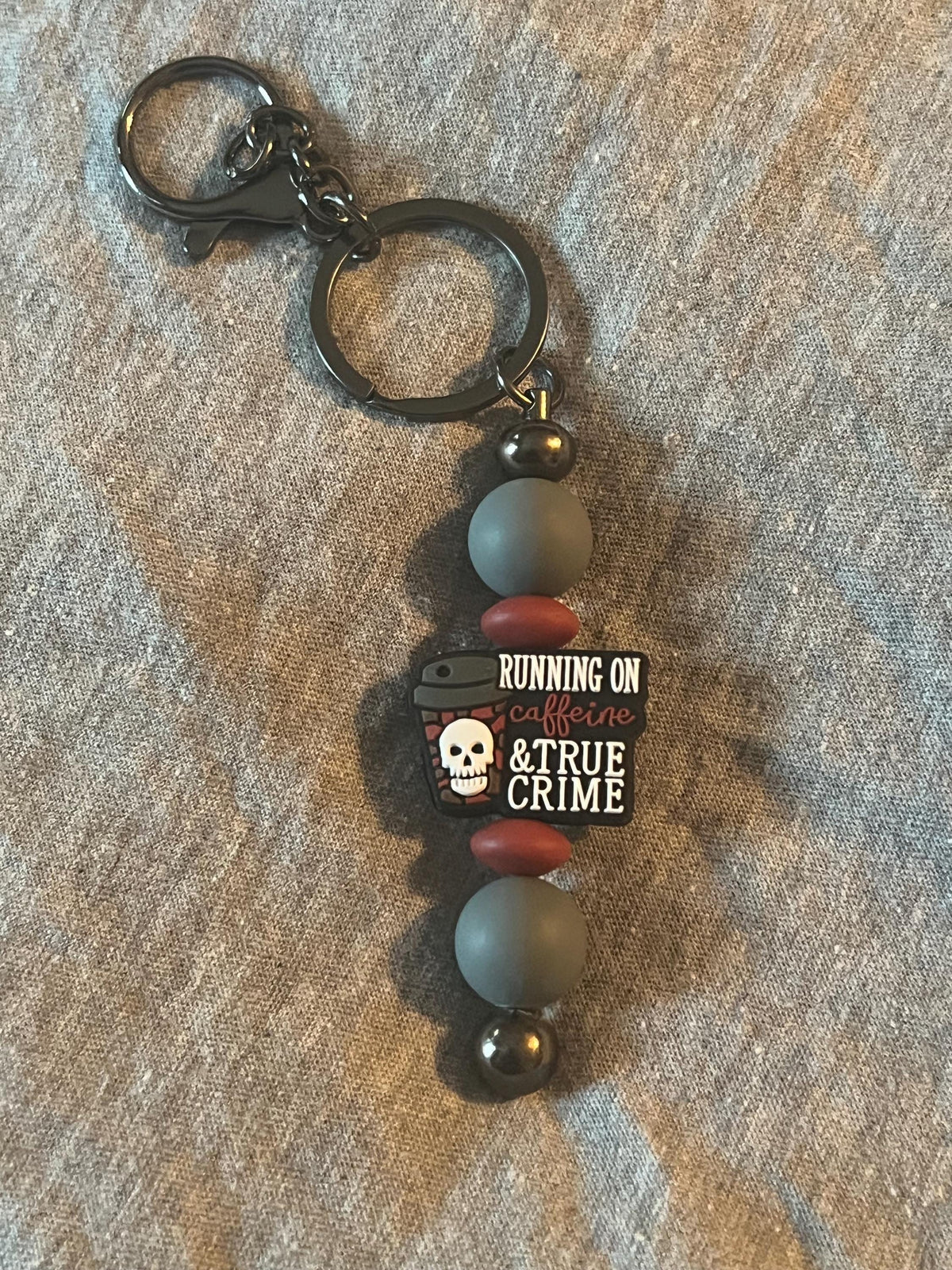 Running on Caffeine and True Crime Keychain